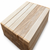 Unfinished kiln dried ash turning blanks on a white background