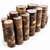 Stacks of round Black Walnut bowl blanks on a white background